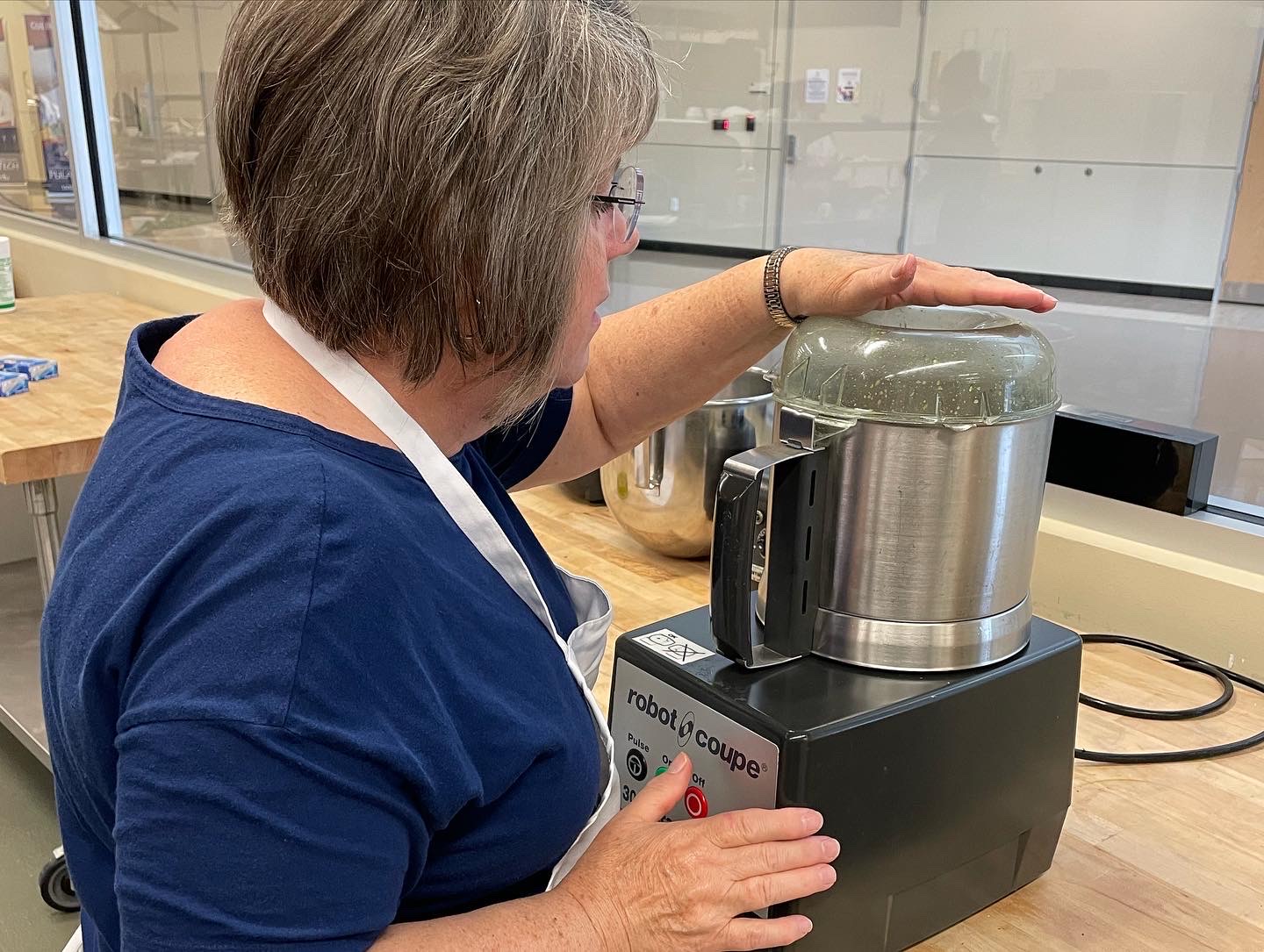 Jean Ince uses a food processor